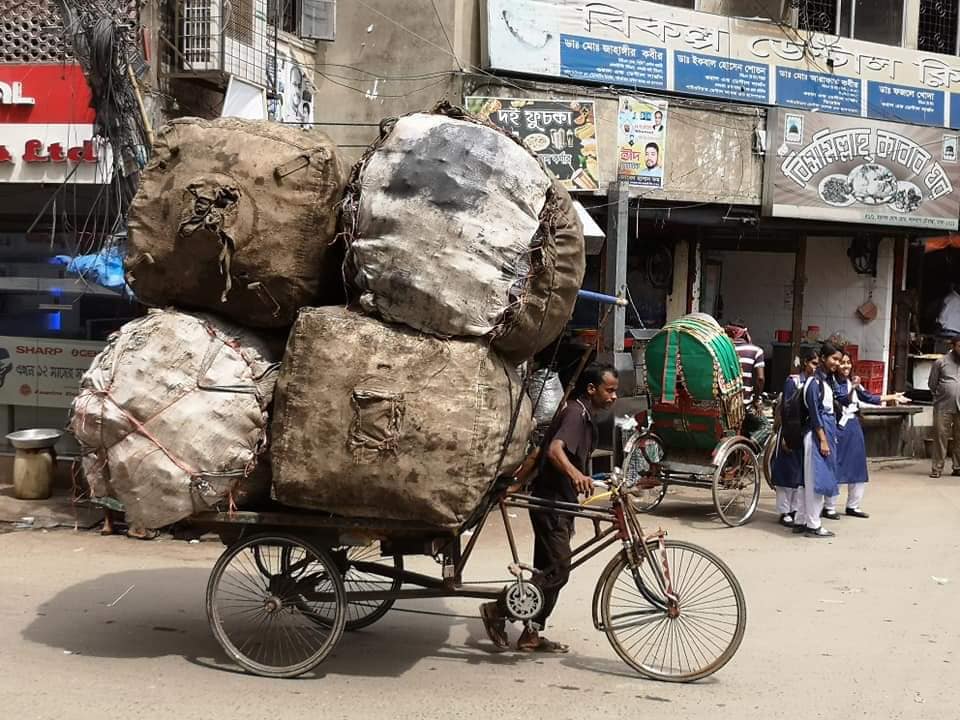 Hard work in the streets of Dhaka but also recycling at it’s best 🚲 Hard work in the streets of Dhaka but also recycling at it’s best 🚲